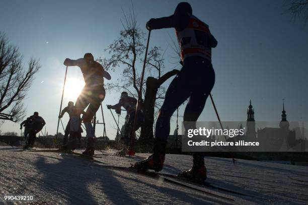 Athletes in action during the semi-final of the men's freestyle team sprint 6 x 1.2 km event at the Cross Country Skiing World Cup in Dresden,...