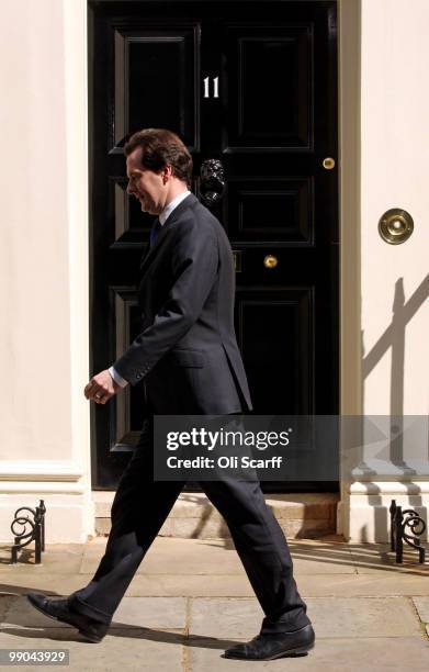 Chancellor of the Exchequer George Osborne walks past Number 11 Downing Street on May 12, 2010 in London, England. After five days of negotiation a...