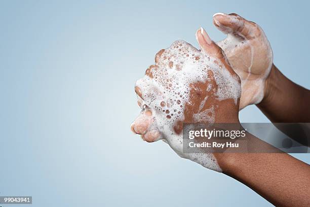 black woman washing hands with soap - washing hands close up stock pictures, royalty-free photos & images