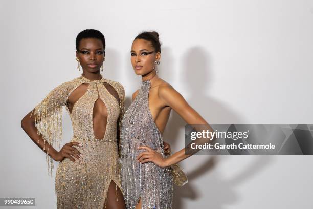 Maria Borges and Cindy Bruna backstage before the Georges Hobeika Haute Couture Fall Winter 2018/2019 show as part of Paris Fashion Week on July 2,...