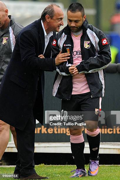 Delio Rossi coach of Palermo speaks to Fabrizio Miccoli as he walks off during the Serie A match between Siena and Palermo at Stadio Artemio Franchi...
