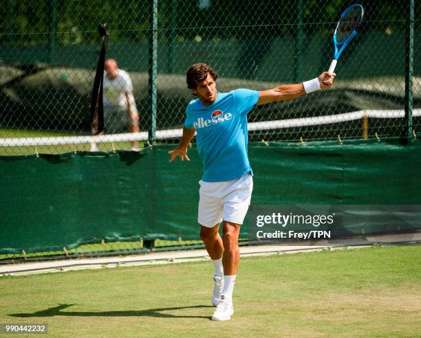 Feliciano Lopez of Spain practices before the start of the Championships at the All England Tennis and Croquet Club in Wimbledon on July 1, 2018 in...