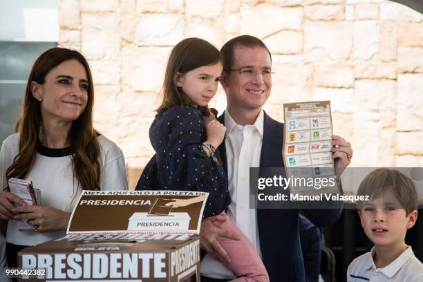 Ricardo Anaya , Presidential Candidate for the coalition 'Por Mexico al Frente', with his wife Carolina Martinez and children, shows his ballot at...
