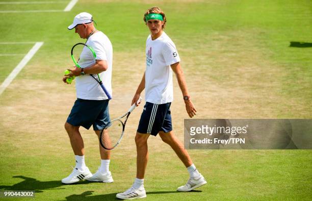 Alexander Zverev of Germany practices before the start of the Championships at the All England Tennis and Croquet Club in Wimbledon on July 1, 2018...