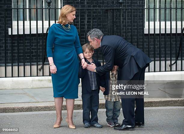 Leader of Britain's ruling Labour Party, Gordon Brown, his wife Sarah, children John and James prepare to walk to his car after he announced his...