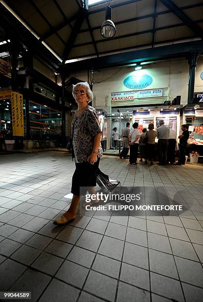 Pensioner shops in Athens central market on May 12, 2010.Greece on Wednesday was to receive a first dose of 5.5 billion euros from the IMF under a...