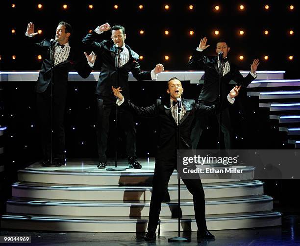 Australian vocal group Human Nature Toby Allen, Phil Burton, Andrew Tierney and Michael Tierney perform after announcing a two-year extension of...