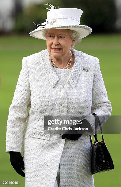 Queen Elizabeth II reviews the Company of Pikemen and Musketeers at HAC Armoury House on May 12, 2010 in London, England.