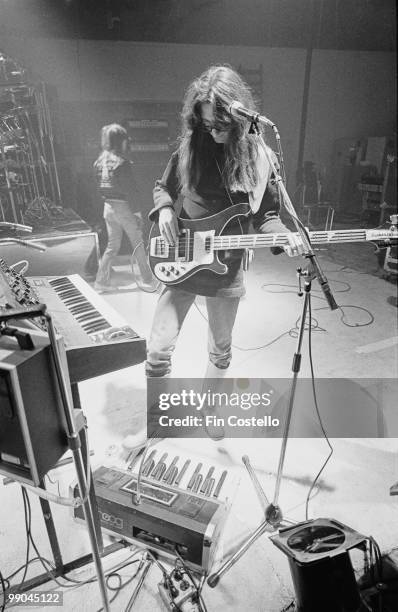 Bassist Geddy Lee, of Canadian progressive rock band Rush, at a studio in Shepperton, Surrey, 2nd December 1978. He plays a small Moog synthesizer...