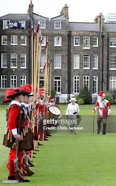 Queen Elizabeth II reviews the Company of Pikemen and Musketeers at HAC Armoury House on May 12, 2010 in London, England.