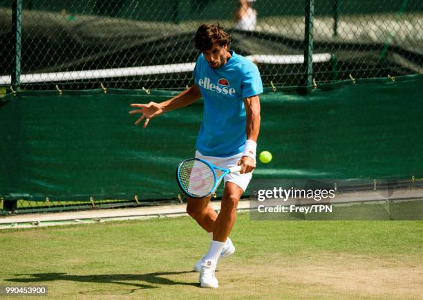 Feliciano Lopez of Spain practices before the start of the Championships at the All England Tennis and Croquet Club in Wimbledon on July 1, 2018 in...