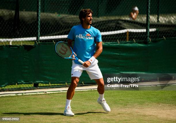 Feliciano Lopez of Spain practices before the start of the Championships at the All England Tennis and Croquet Club in Wimbledon on July 1, 2018 in...