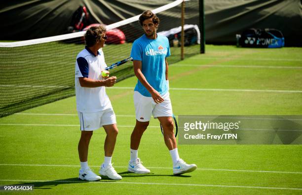 Feliciano Lopez of Spain practices before the start of the Championships at the All England Tennis and Croquet Club in Wimbledon on July 1, 2018 in...