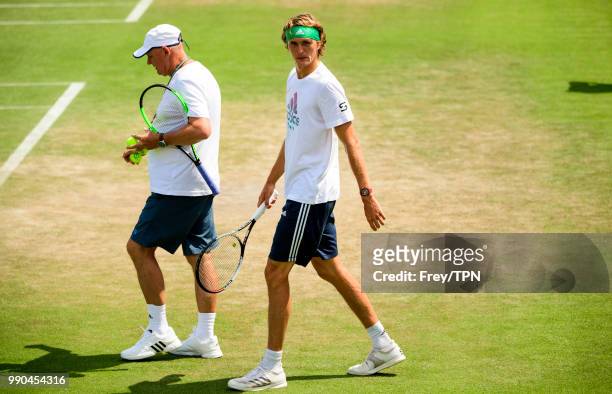 Alexander Zverev of Germany practices before the start of the Championships at the All England Tennis and Croquet Club in Wimbledon on July 1, 2018...