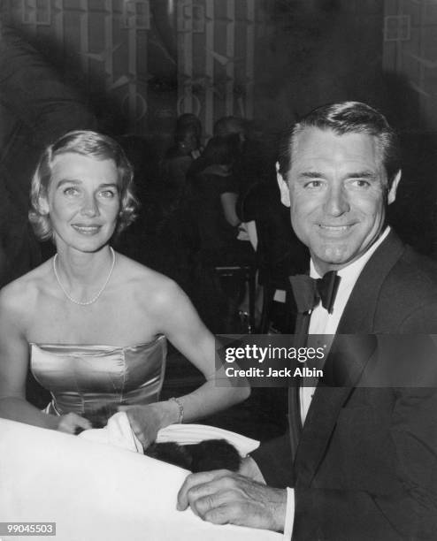 British-American actor Cary Grant with his third wife, actress and writer Betsy Drake at the Academy Awards, circa 1955.