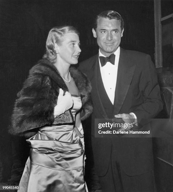 British-American actor Cary Grant with his third wife, actress and writer Betsy Drake at the Academy Awards, circa 1955.