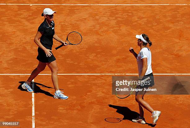 Anabel Medina Garrigues of Spain celebrates a point with her doubles partner Liezel Huber of the USA in their second round match against Chia-Jung...