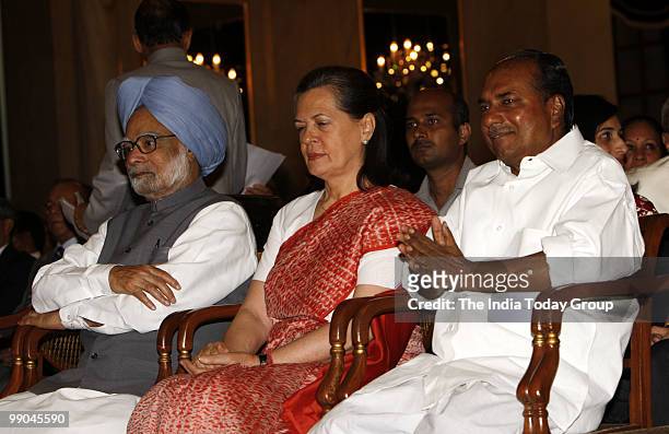 Prime Minister Manmohan Singh, Congress chief Sonia Gandhi and Defence Minister A.K. Antony at the swearing-in ceremony of Justice S.H. Kapadia as...