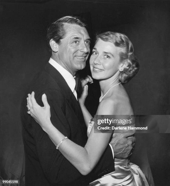 British-American actor Cary Grant with his third wife, actress and writer Betsy Drake at an Academy Awards at Romanoff's, Beverly Hills, circa 1955.