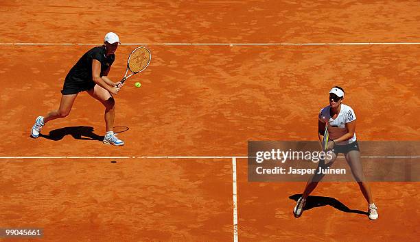 Liezel Huber of the USA plays a backhand with her doubles partner Anabel Medina Garrigues of Spain in their second round match against Chia-Jung...