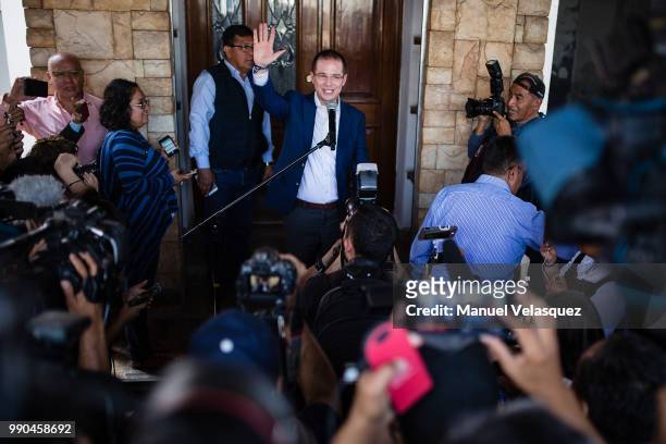 Ricardo Anaya, Presidential Candidate for the coalition 'Por Mexico al Frente', waves outside his polling station as part of the Mexico 2018...