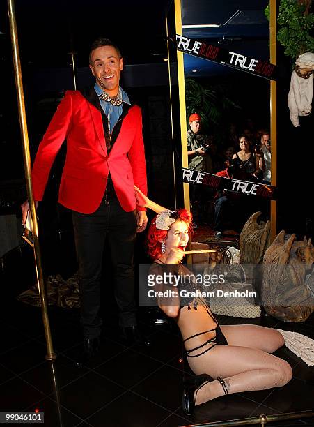 Burlesque performer Lauren LaRouge includes Donny Galella in her show at FANGTASIA, the launch event for the vampire series True Blood Season 2 on...