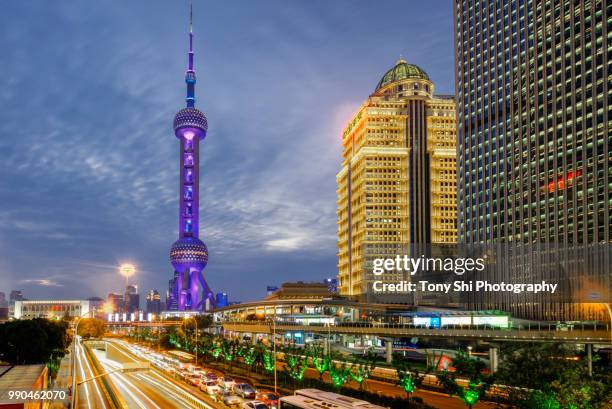 shanghai pudong district - iconic oriental pearl tv tower - pearl district stock pictures, royalty-free photos & images