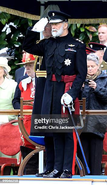 Prince Michael of Kent salutes before the arrival of Queen Elizabeth II at the review of the Company of Pikemen and Musketeers at HAC Armoury House...