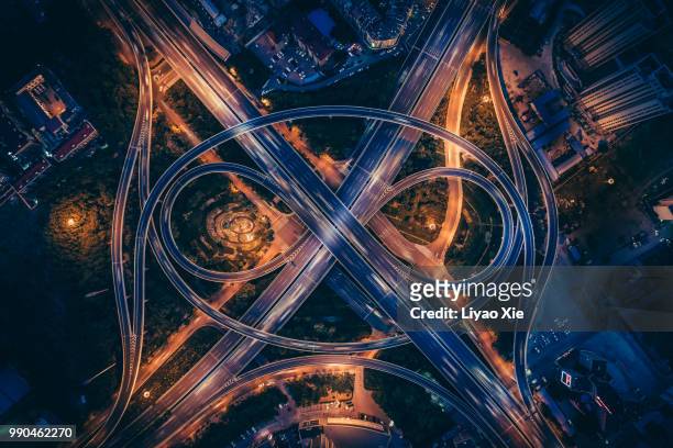 aerial view of overpass - road intersection stock pictures, royalty-free photos & images