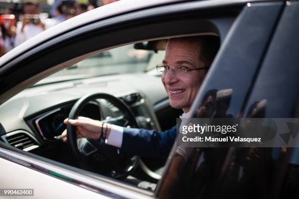 Ricardo Anaya, Presidential Candidate for the coalition 'Por Mexico al Frente', gestures outside his polling station as part of the Mexico 2018...