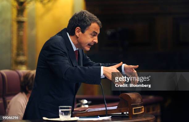Jose Luis Rodriquez Zapatero, Spain's prime minister, gestures as he speaks to parliament in Madrid, Spain, on Wednesday, May 12, 2010. Spain will...