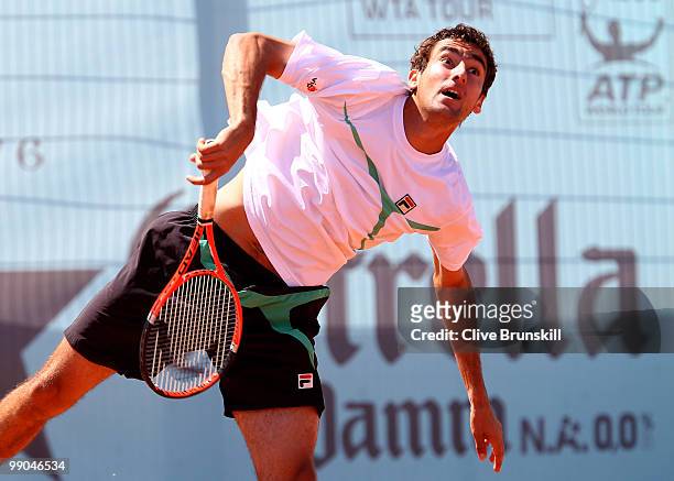 Marin Cilic of Croatia serves against Eduardo Schwank of Argentina in their second round match during the Mutua Madrilena Madrid Open tennis...