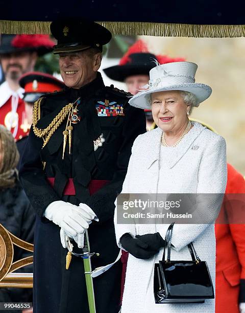 Queen Elizabeth II and Prince Philip, Duke of Edinburgh review the Company of Pikemen and Musketeers at HAC Armoury House on May 12, 2010 in London,...