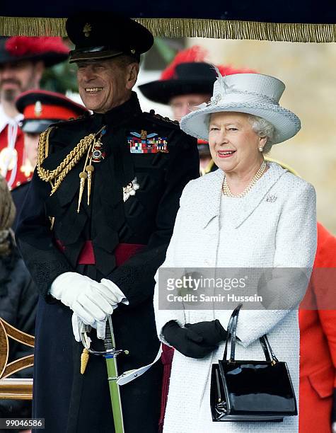 Queen Elizabeth II and Prince Philip, Duke of Edinburgh review the Company of Pikemen and Musketeers at HAC Armoury House on May 12, 2010 in London,...