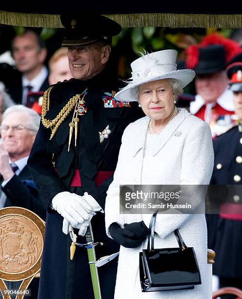Queen Elizabeth II and Prince Philip, Duke of Edinburgh review the Company of Pikemen and Musketeers at HAC Armoury House on May 12, 2010 in London,...