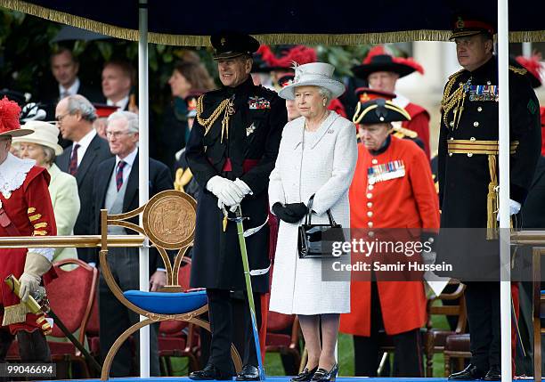 Queen Elizabeth II and Prince Philip, Duke of Edinburgh review the Company of Pikemen and Musketeers at HAC Armoury House on May 12, 2010 in London,...