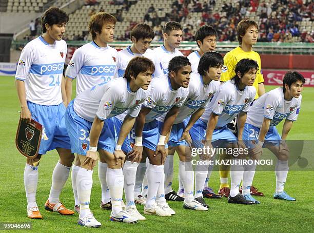 Starting players of South Korea's Pohang Steelers pose during a photo session prior to their their AFC Champions League football match against...