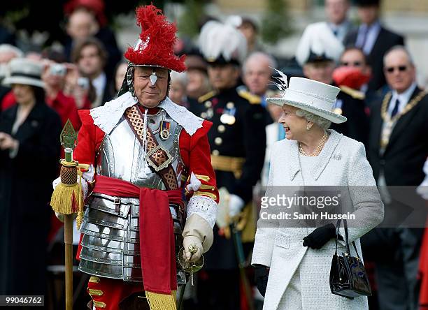 Queen Elizabeth II reviews the Company of Pikemen and Musketeers at HAC Armoury House on May 12, 2010 in London, England.