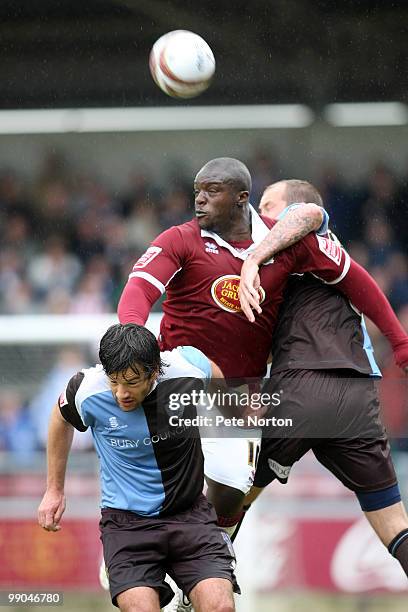 Adebayo Akinfenwa of Northampton Town heads the ball during the Coca Cola League Two match between Northampton Town and Bury held at the Sixfields...