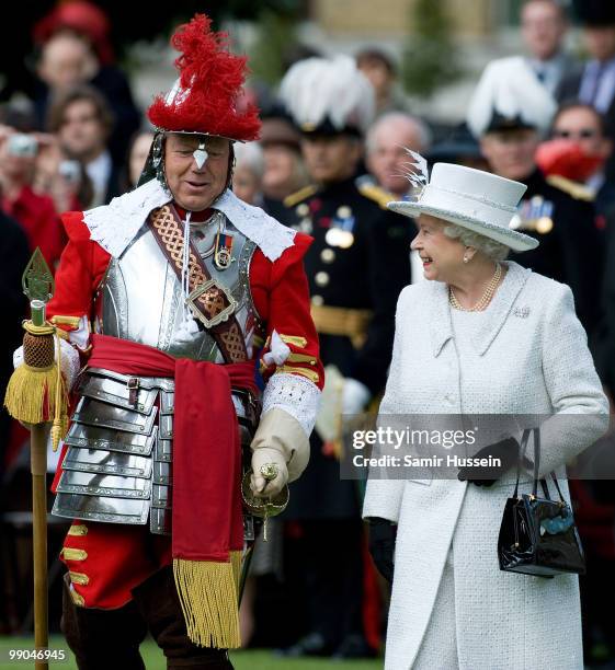 Queen Elizabeth II reviews the Company of Pikemen and Musketeers at HAC Armoury House on May 12, 2010 in London, England.