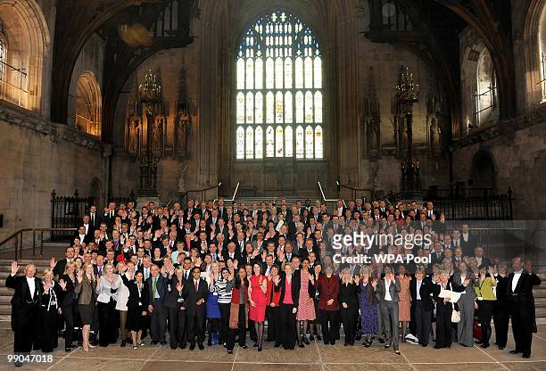 The majority of the 232 new MP's, elected in last week's General Election, pose for a group picture, with Doormen in Westminster Hall, on May 12,...