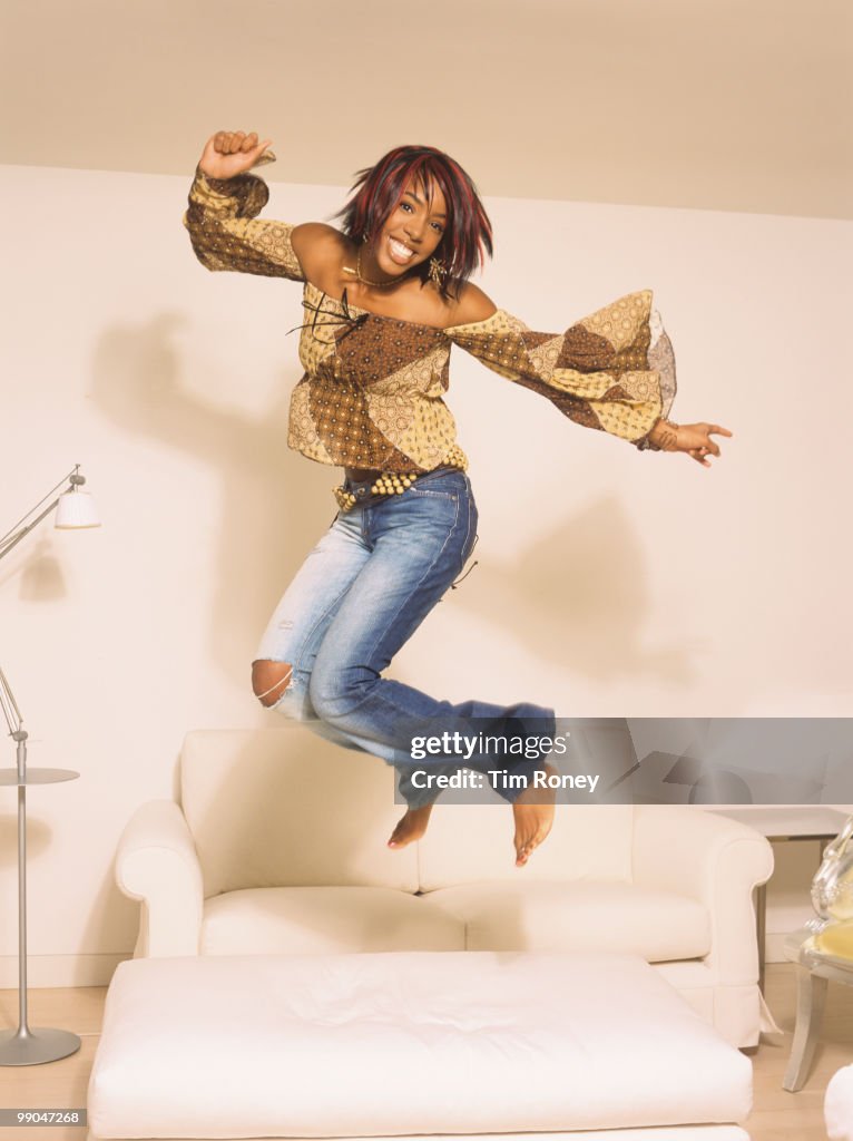 Kelly Rowl Kelly Rowland, singer and former member of 'Destiny's Child', jumping ...