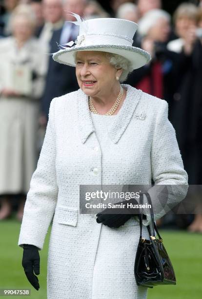 Queen Elizabeth II reviews the Company of Pikemen and Musketeers at HAC Armoury House on May 12, 2010 in London, England.