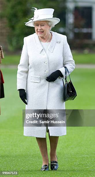 Queen Elizabeth II reviews the Company of Pikemen and Musketeers at HAC Armoury House on May 12, 2010 in London, England.