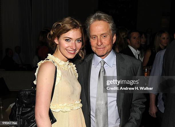 Imogen Poots and Michael Douglas attend the premiere of "Solitary Man" after party at Rouge Tomate on May 11, 2010 in New York City.