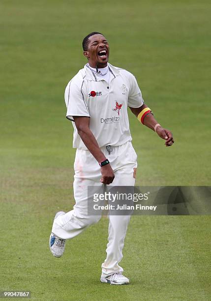Makhaya Ntini of Kent reacts whilst bowling during day two of the LV= County Championship match between Essex and Kent at the County ground on May...