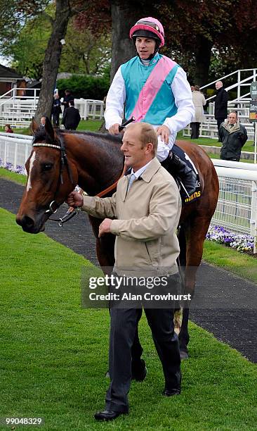 Aviate and Eddie Ahern return after winning The Tattersalls Musidora Stakes at York racecourse on May 12, 2010 in York, England