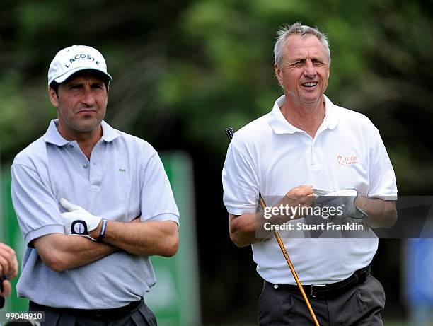 Football legend Johan Cruyff of The Netherlands looks on beside Jose Maria Olazabal of Spain during the pro - am of the Open Cala Millor Mallorca at...