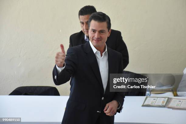 President of Mexico Enrique Pena Nieto reacts after voting during the Mexico 2018 Presidential Election on July 1, 2018 in Mexico City, Mexico.