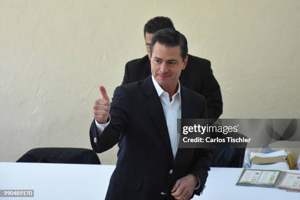 President of Mexico Enrique Pena Nieto reacts after voting during the Mexico 2018 Presidential Election on July 1, 2018 in Mexico City, Mexico.